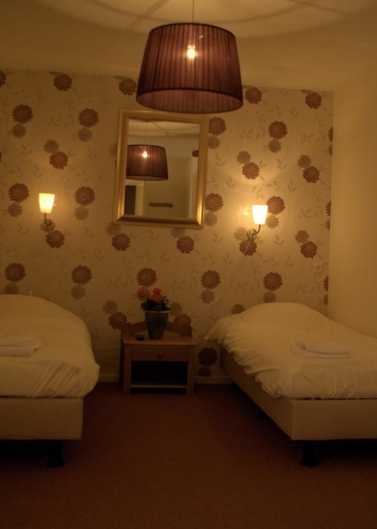 Hotel "De Steenen Man" Zurich Buitenkant foto