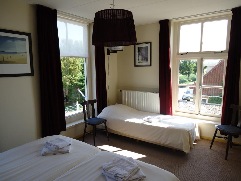 Hotel "De Steenen Man" Zurich Buitenkant foto